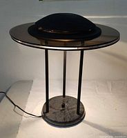 Side view of entire lamp showing structure and cord