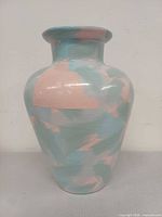 Front view of John Bergen pastel glazed pottery vase