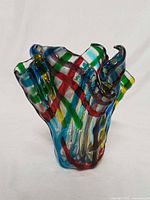 Front view of multicolor fused glass handkerchief vase
