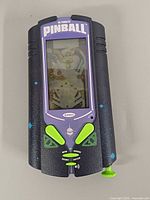 Front view of Radica Ultimate Pinball handheld showing screen and controls