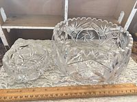 Large cut crystal serving bowl and smaller ashtray with ruler for scale