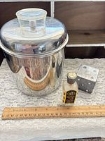All three items next to ruler for scale