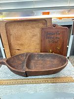 Front view showing all three wooden items: divided bowl, square tray, hanging plaque