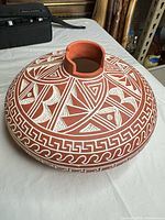Top angled view showing shape and incised decoration