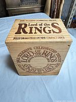 Wooden storage box with laser-etched lettering for Lord of the Rings dramatized on nine compact discs