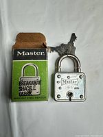 Padlock with keys and original box front view