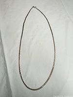Full view of entire sterling silver box chain necklace laid flat.