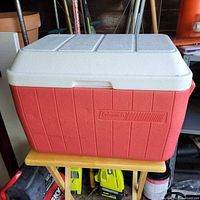 Cooler closed showing red body and white lid