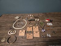 Full layout of mixed jewelry items on table