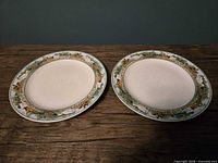 Two Studio Nova Country Inn plates front view showing pattern