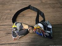 Front view of the pre-tied bow tie showing character print and adjustable strap