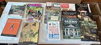 Full group shot of all 15 books and magazines laid out in two rows