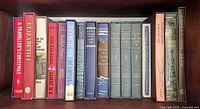 Shelf showing full assortment of hardcover spines