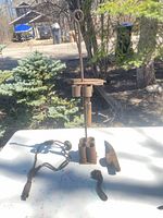 Group shot of all five tools on table outdoors