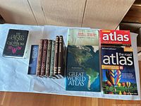 Group shot of all eleven books on table