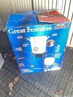 Box showing Masterbuilt 30-quart turkey fryer kit with image of pot, basket and burner