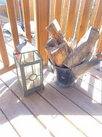 Lantern and scuttle side by side on deck