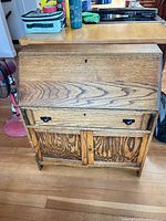 Full view of oak drop-front secretary desk
