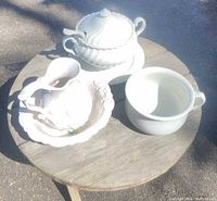 Full set displayed on table outdoors