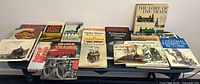 Full lot of railway books laid out on table