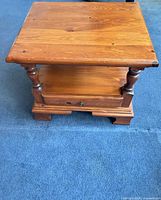 Front view of solid pine end table showing top surface and structure