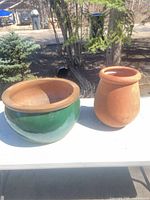 Overview of both planters on table outdoors