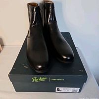 Pair of boots on original box showing overall appearance