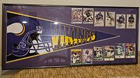 Full view of framed pennant with trading cards