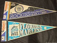 Full view of both WinCraft inaugural year 1993 pennants