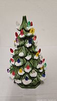 Full view of ceramic tree with peg lights inserted