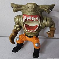 Front view of hammerhead Street Sharks figure showing armor, mouth, clothing