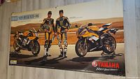 Full view of Yamaha vinyl poster showing entire graphic and both motorcycles