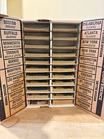 Open Card Locker showing left interior column with team listings and card shelves