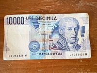 Front of Italy 10,000 lire banknote serial LK253426M