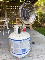 Full view of heater head attached to 20-lb propane cylinder