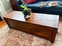 Closed view of coffee table showing finish and overall form