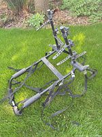 Overall view of SportRack trunk bike rack showing frame, arms, rubber cradles and mounting straps