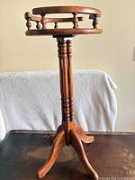Full view of oak plant stand showing overall design