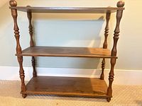 Front view of three-tier wooden bookshelf