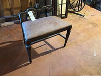 Front view of wooden vanity bench with upholstered seat and backrest