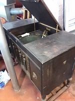Overall view of closed Brunswick console phonograph cabinet