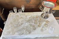 Overall view showing all glassware and silver-tone cooler