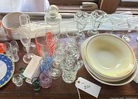 Overall view of assorted glassware, plates and bowls