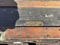 Brass Haskell Brothers nameplate on trunk exterior