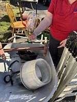 Overall view showing aluminum reflector in wheelbarrow