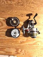 Group shot showing spinning reel, fly reel and one spare spool