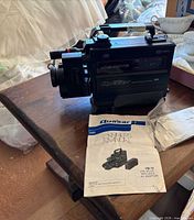 Quasar VM-10 VHS camcorder on table