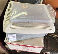 NuTone 763RL exhaust fan-light housing, grille in plastic, original box visible