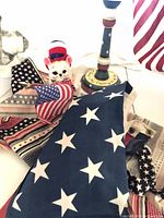 Overview of fabrics, figurine, candlestick