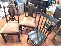 Group shot of three antique side chairs